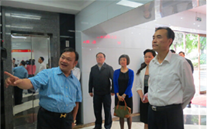 重庆市市委常委、统战部部长刘光磊来AG8.COM集团视察调研